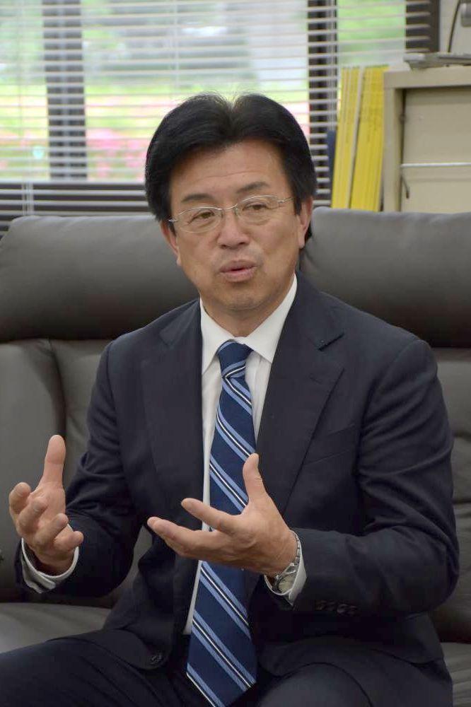 飯田智男氏