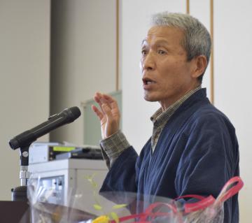 講演する桜井昌司さん=4月末、都内