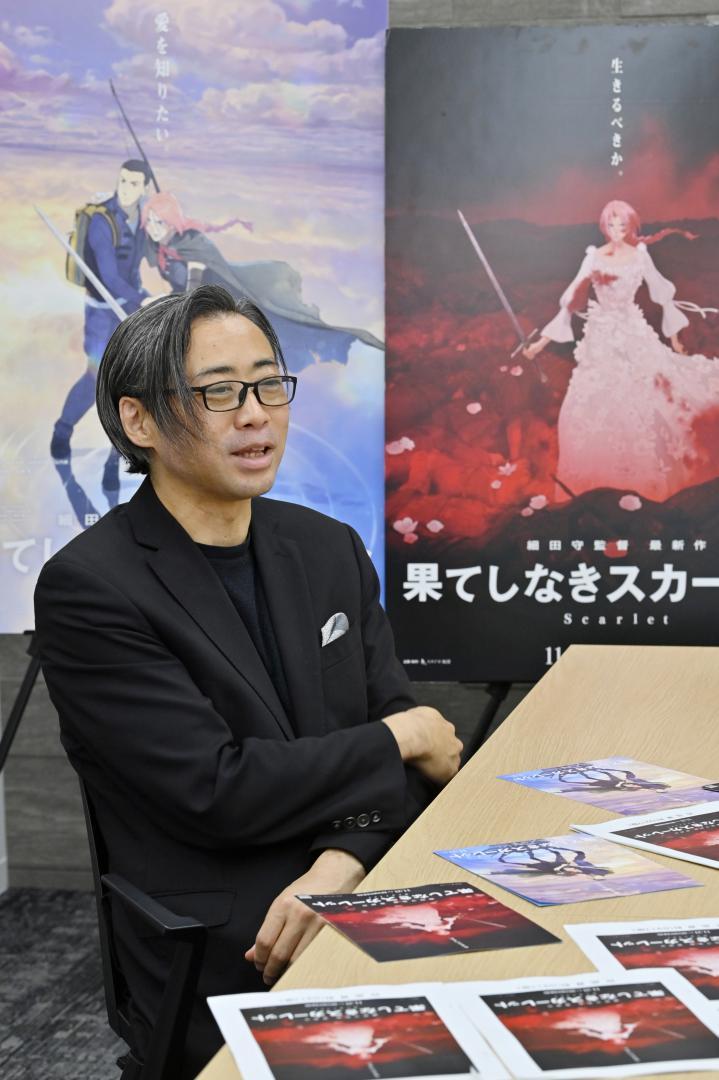 作品づくりへの思いを語る斎藤優一郎さん=東京都千代田区
